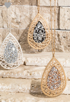 Filigree teardrop with glitter stone accent pendant necklace